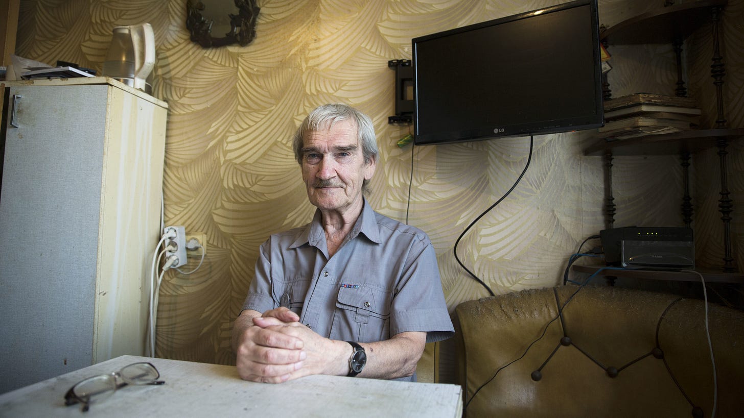 Stanislav Petrov, a former Soviet military officer, poses at his home in 2015 near Moscow. In 1983, he was on duty when the Soviet Union's early warning satellite indicated the U.S. had fired nuclear weapons at his country. He suspected, correctly, it was a false alarm and did not immediately send the report up the chain of command. Petrov died at age 77.Pavel Golovkin/AP...