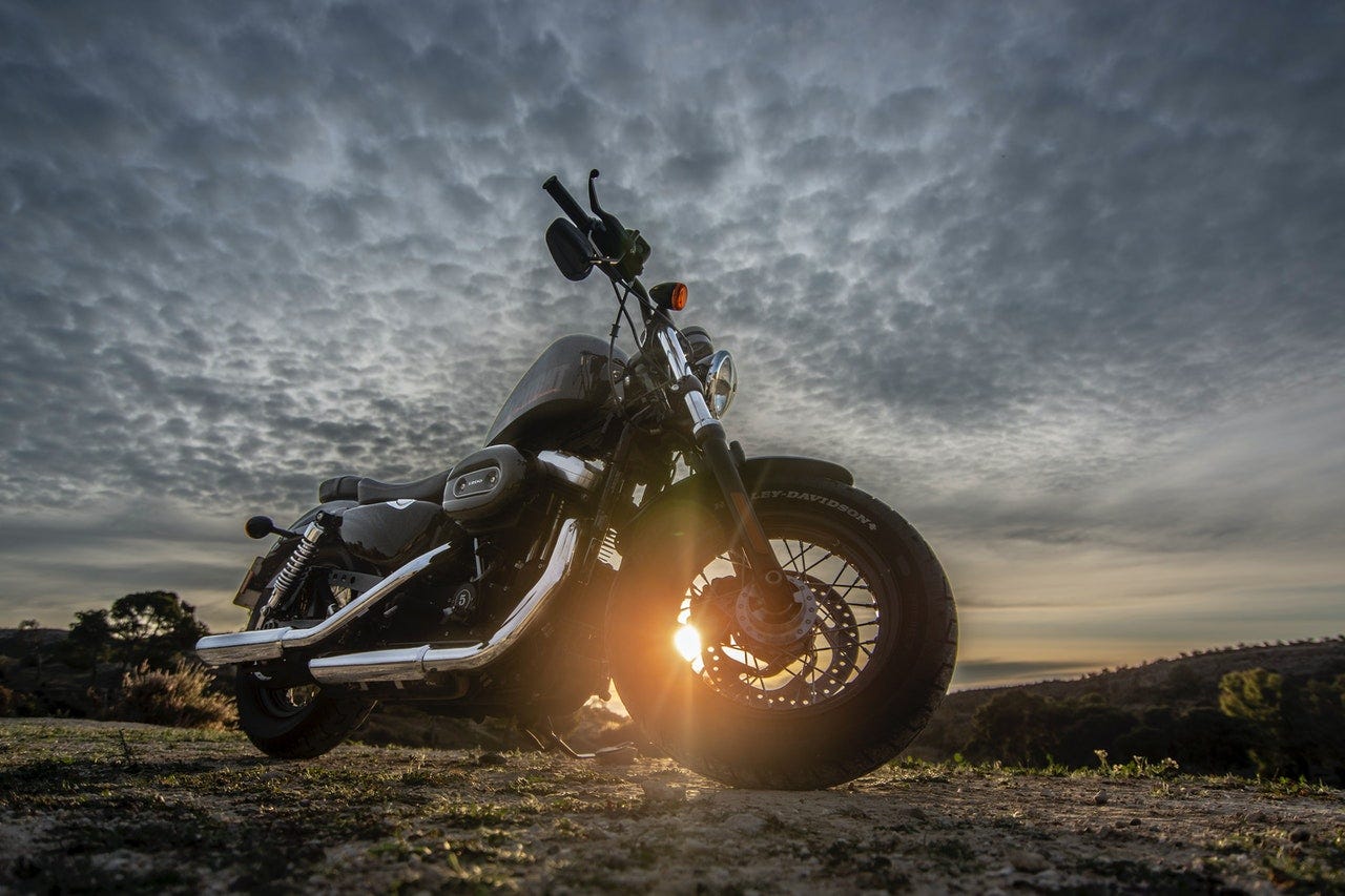 Photo by Javier Aguilera(https://www.pexels.com/@jamphotography?utm_content=attributionCopyText&utm_medium=referral&utm_source=pexels) from Pexels(https://www.pexels.com/photo/low-angle-photo-of-black-harley-davidson-forty-eight-1200-motorcycle-parked-on-dirt-road-during-golden-hour-2611690/?utm_content=attributionCopyText&utm_medium=referral&utm_source=pexels)